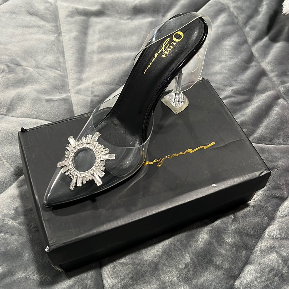 Brand new, never worn. Size 10.